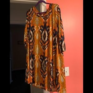 Blaze a trail in this 3X bright orange/gold print